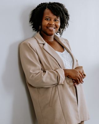 Photo of Mirlande M. Dickinson, Registered Psychotherapist (Qualifying), BSW, RSW, MA(c), RP-Q