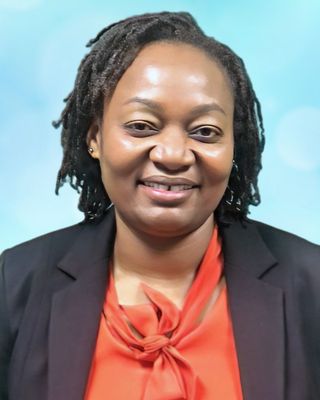 Photo of Delphine Munya, APRN, CNP, Psychiatric Nurse Practitioner