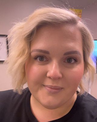 Photo of Emily Aust, Counselor, MA, LPCC