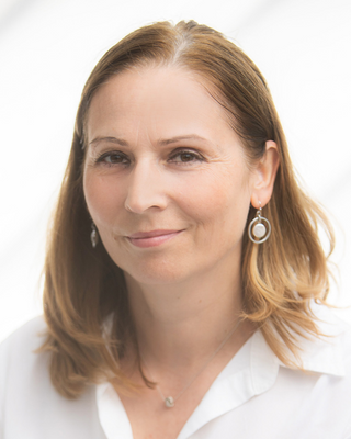 Photo of Alina Olaru, Mental Health Counselor, MA, LMHC