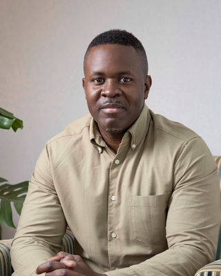 Photo of David Olubuyide, Psychotherapist, MSc, MNCPS Acc.