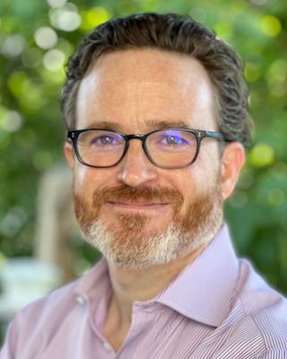 Photo of Alistair McKnight, Counselor, PsyaD, LMHC