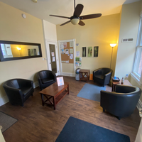 Gallery Photo of The entrance to the waiting room is located in the back of the building. Have a seat and I'll bring you to our therapy space.
