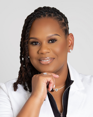 Photo of Taaka Burman, Counselor, LMHC