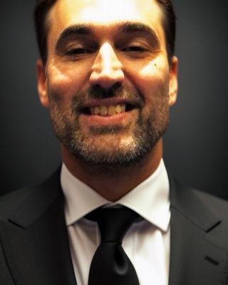 Photo of Dr. Andres Vinuela, Psychiatrist, MD