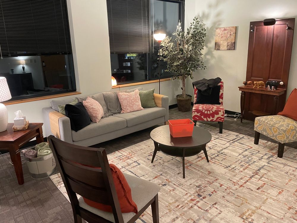 The lobby! Featuring, comfortable chairs, a couch, fidgets, coffee, tea, water, and snacks. Plus, a stellar view!