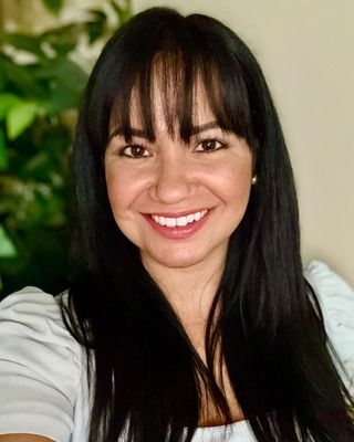Photo of Mailin Delgado, Counselor, EdS, LMHC
