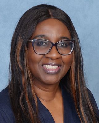 Photo of Olaitan Akinlehin, Psychiatric Nurse Practitioner, PMHNP