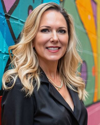 Photo of Lori Ann Ryland, Psychologist, PhD, LP, BCBA-D, CAADC