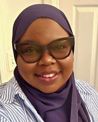 Photo of Taji Ameerah Billups, MSW