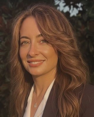 Photo of Marcela Larrad, Licensed Mental Health Counselor, LMHC