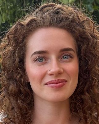 Photo of Michaela Champagne, Counselor, LMHC