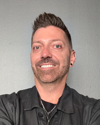 Photo of Dr. Devin Bercaw, Counselor, PhD, LCPC, ABS, E-RYT