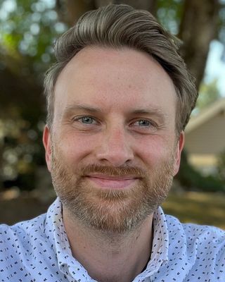 Photo of Travis Munday, Counselor, MA, LMHC