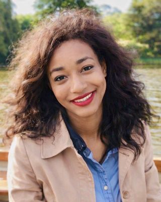 Photo of April-Emily Moorer, Counselor, LPCC, LMHC, EMDR, RYT400