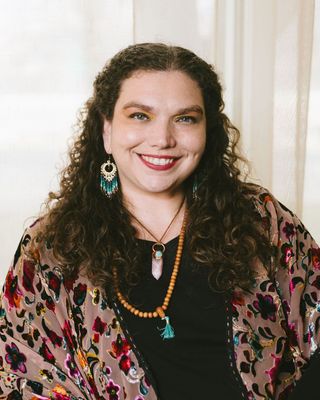 Photo of Emily Szalay, Counselor, CMHC
