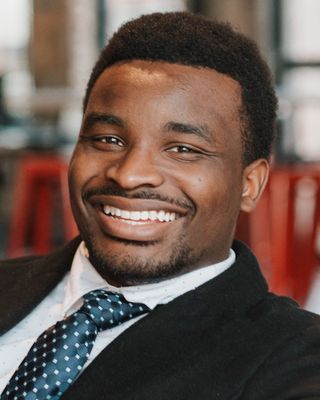 Photo of Ej Umoh, JD, LSW