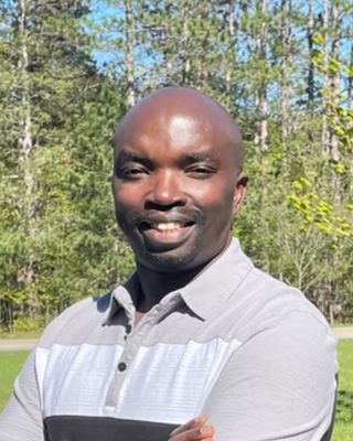 Photo of Godfrey Abuya, Psychiatric Nurse Practitioner, PMHNP