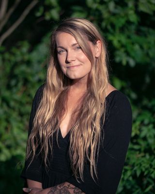 Photo of Mackenzie Kozak, Licensed Professional Counselor, LCMHC, MA, MFA, NCC, CGCS
