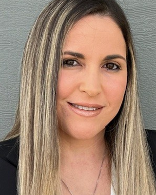 Photo of Leticia Loret de Mola, Psychiatric Nurse Practitioner, MSN, APRN, PMHNP, PMGT-BC