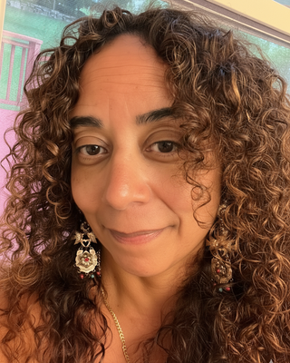 Photo of Dr. Yessenia Guglielmi, Licensed Professional Counselor, MA, LPC, ACS, DLitt, LMHC