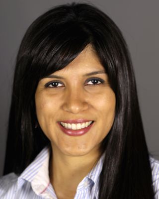 Photo of Dr. Floryana Viquez, Psychologist in H1B, QC