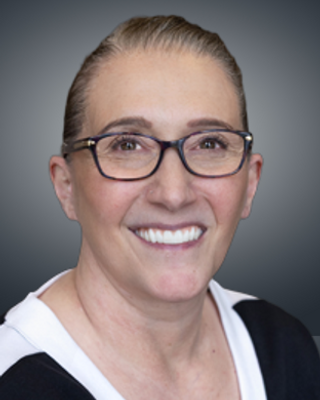 Photo of Kelly M Valente, Marriage & Family Therapist, MS, MA, LMFT