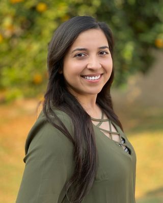 Photo of Margaret Guzman, Marriage & Family Therapist, MA, LMFT, CPTT