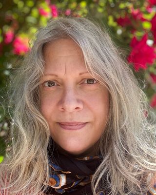 Photo of Lisa A. Rainwater, Licensed Clinical Mental Health Counselor, LCMHC, MA, PhD, CCTP, CT
