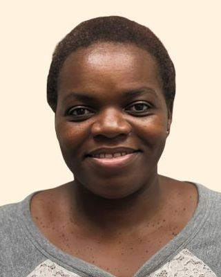 Photo of Dr. Consola Esambe Lobwede, Psychiatrist, MD