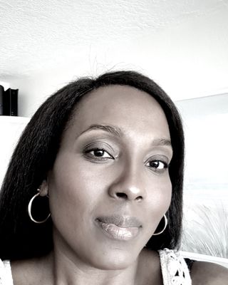 Photo of Joanna Ahounou - Restore Psychiatric Wellness, Psychiatric Nurse Practitioner, MSN, PHMNP, BC