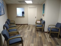 Gallery Photo of Patient Wait Room with Check-In Window