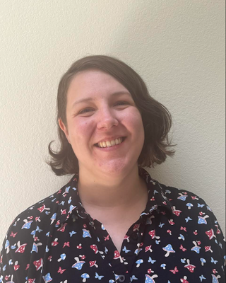 Photo of Elizabeth Tate, Licensed Professional Counselor Candidate, MA, LPCC