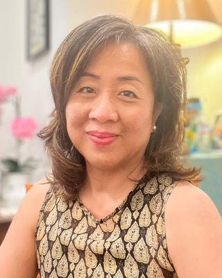 Photo of Evelyn Co, Licensed Professional Counselor, MA, ATR-BC, LMFT-CA