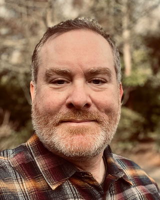 Photo of Justin Clarke, Counselor, LMHC