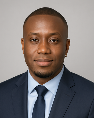 Photo of Dr. Joshua Osamba, Psychiatric Nurse Practitioner, DNP