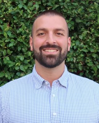 Photo of Ali Afrasiabi, Counselor, MA, LMHC