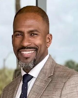 Photo of Reginald Perard, Psychiatric Nurse Practitioner, FNP-C, PMHNP, -BC