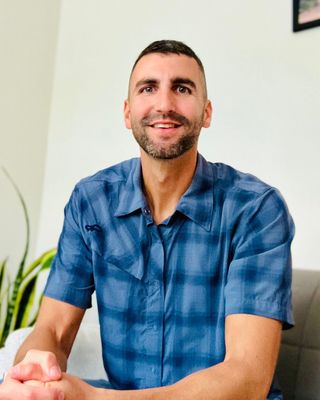 Photo of Brandon Roman, Counselor, LMHC-D