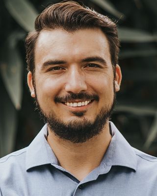 Photo of Dr. Jordan Hoffman, Psychologist, PsyD, CBIS