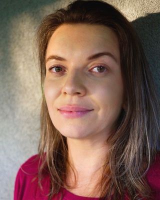 Photo of NAYO BUTLER-PUTTOCK, Psychotherapist, MSc, BPC