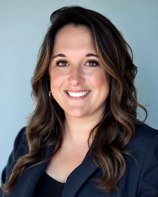 Photo of Liz Comstock, Psychiatric Nurse Practitioner, MSN, MCJ, APRN, PMHNP, CFRC