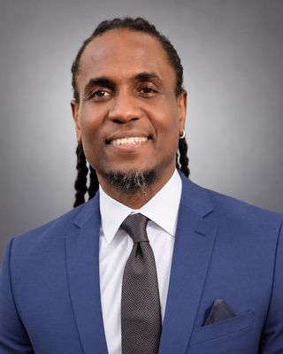 Photo of Dr. Derek Sinju, Psychiatric Nurse Practitioner, DNP