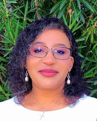 Photo of Medina Kena Kamau, Psychiatric Nurse Practitioner, PhD, DNP, FPMHNP