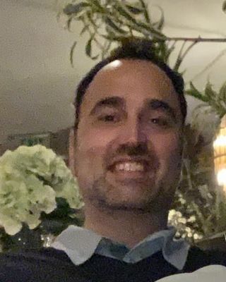 Photo of Dr. Andres Vinuela, Psychiatrist, MD