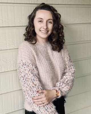 Photo of Caitlin McGee, LMLP