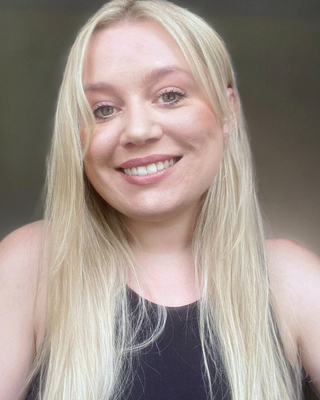 Photo of Alex Ogando, Psychotherapist, MA, HCPC-Art Therap.