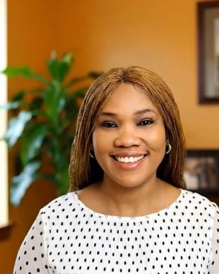 Photo of Dr. Isi Etakibuebu, Psychiatric Nurse Practitioner, DNP, PMHNP, BC, APRN