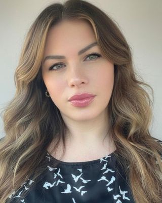 Photo of Elisabeth Burn, Counselor, LMHC-D