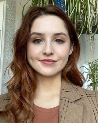 Photo of Mallory Thrall, Licensed Mental Health Counselor, MA, LMHC